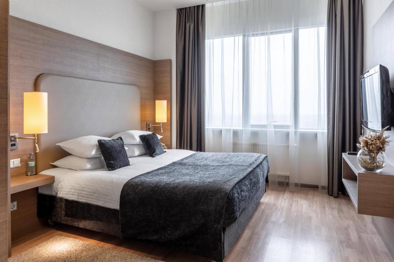 Ramada Encore Kiev Quarto foto
